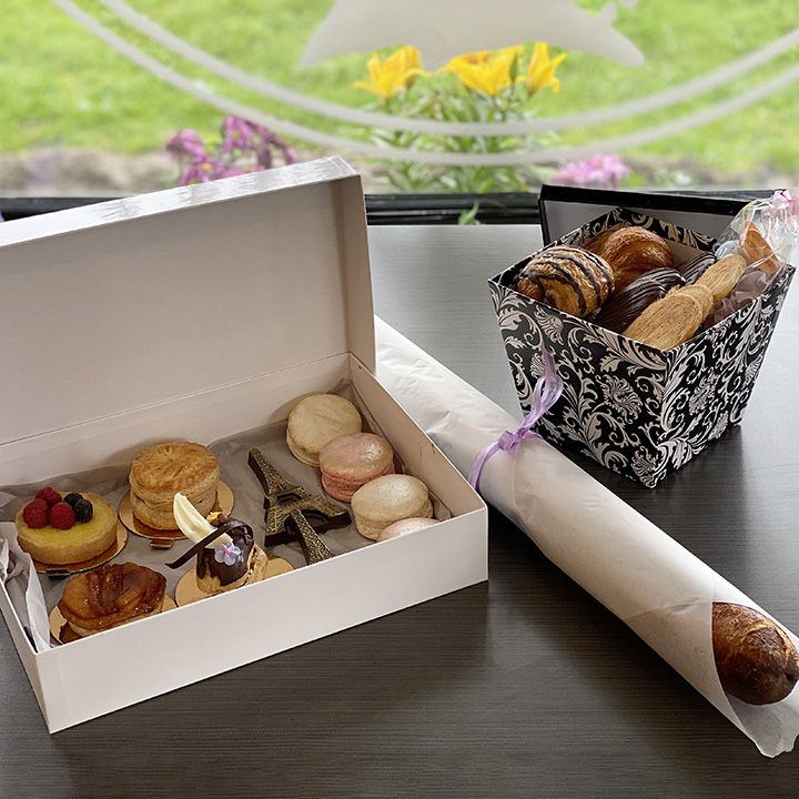 Willow Cakes and Pastries box of cookies and other items